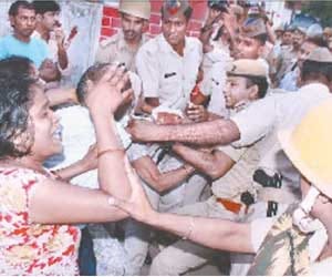 up police men allegedly beat woman in police station   
