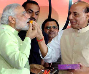 advani, manmohan wishes modi happy birthday