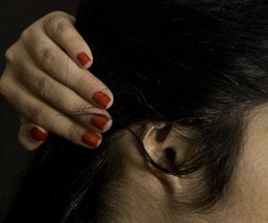 Man bites wife's ear