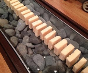 man uses his own body fat to make soap