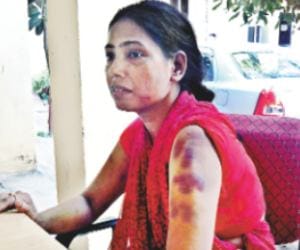 husband beats wife for another woman