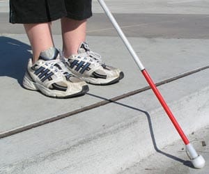 Man pretending to be blind falls into a ditch and dies