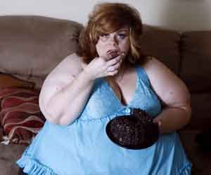 Woman with erotic obsession with food eats doughnuts during sex