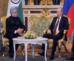 pm, putin ask officials to resolve kudankulam n-plant issues