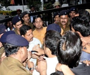 police niece sticks at students and media personnel