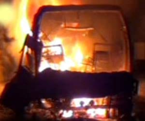Scrap-laden truck fire from short circuit