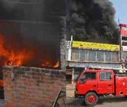 Tractor smashed wall, set fire to house