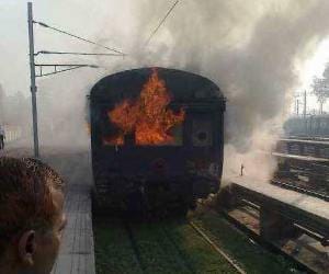gomti express catch fire, stampede in coach