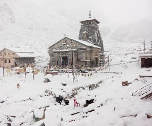 On the night snowfall in Shimla ridge littered with white sheets