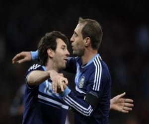 lionel messi lifts barcelona in quarters