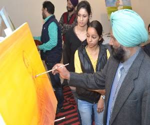photo exhibition_punjab kala bhawan_realistic painting_arts council