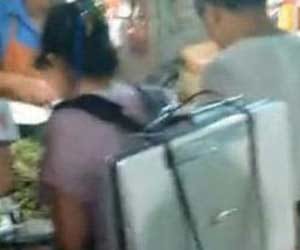 Woman Wears 15 kg Air Purifying ‘Mask’