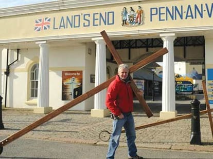 man_carries_cross_