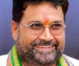 BJP minister Laxmikant Sharma booked 
