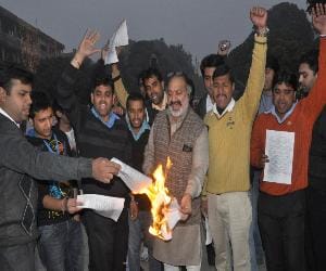 Hindu groups burned a copy of the bill