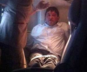 airline passenger is tied up