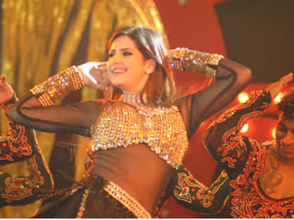 salman, madhuri defend saifai performance, donate rs 25 lakh