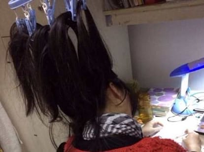 Chinese students tie their hair
