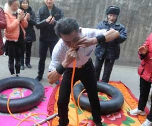 he inflates rubber rings with his nose