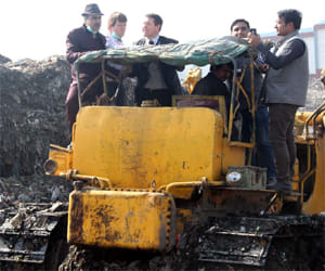 french company would take garbage of gurgaon and faridabad