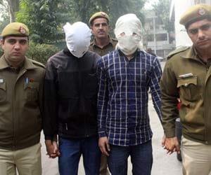 Two run down two waiters, arrested