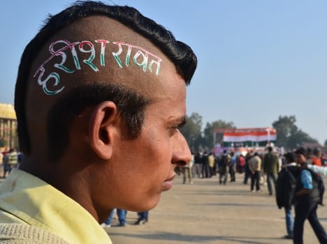 congress bow in front of harish rawat
