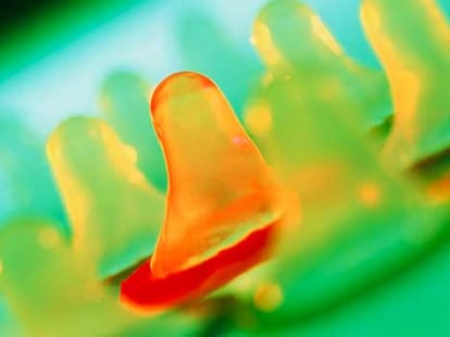 women swallows condom while eating food