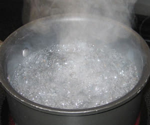 Man burn with hot water during work in factory