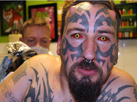 man undergoes body modification to turn into devil