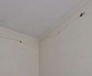 Cracks in walls lying, leaking roof