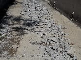 broke roads in Illegal colony 