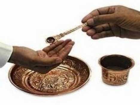 benefits of charnamrit hindu sacred water