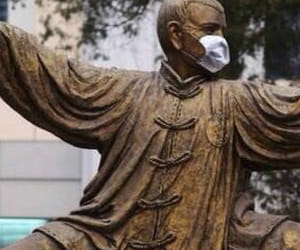 chinese statues hide in mask