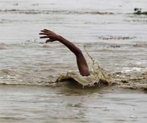 after seeing police, three men jumped in pond.