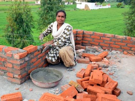 woman making house