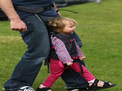 belted bag that enables children suffering from cerebral palsy to walk