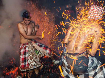 indonesian tradition to lash out with fire for purity of souls