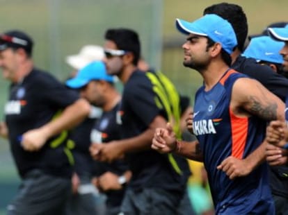 Indian player plays football barefoot during training session