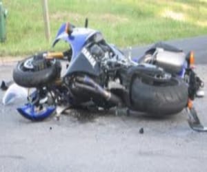 biker died on road accident
