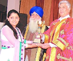 kanika thakur got 3rd position in mba examination