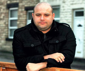 man sues boss for not letting him sit on a chair