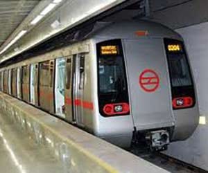 Man enters in subway's tunnel, metro stop
