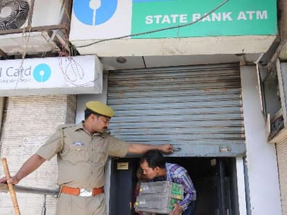 attempt to loot in atm booth at midnight