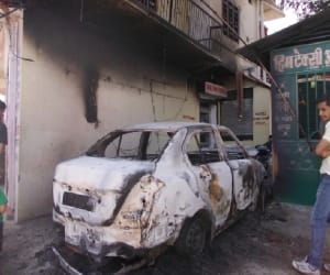 unidentified sat car on fire 