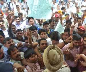 People protest against DLF