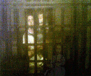 family pictured images of ghosts while visiting museum