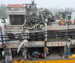 helicopter crashes into a building