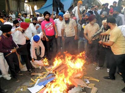 sikh activists_ protest_ against majithia_ distorting_ gurbani