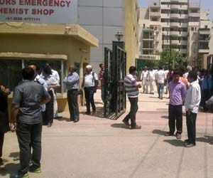plot row: one killed in firing, 100 round fire in noida
