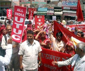 labours protest against private companies